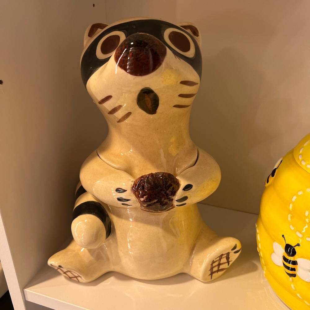 Raccoon cookie jar